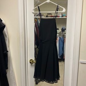 Black mini fit and flair dress with open back